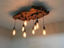 Custom Made Medium Live Edge Olive Wood Chandelier Rustic And Industrial Light Fixture By 7m Woodworking Custommade Com