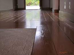 hardwood floor with carpet inlay