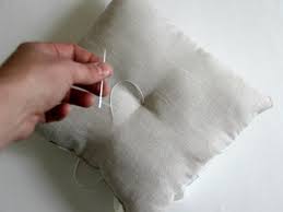 Add a little clump of pillow batting (or the like) to the middle of your fabric circle and pull the loose end of the string tight! How To Sew A Ring Bearer Pillow For A Wedding On Diynetwork Com How Tos Diy