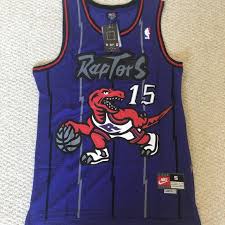 The red and white jerseys follow an identical pattern with the chevron in the center of the jersey and the shorts. Shirts Vince Carter Toronto Raptors Jersey White Sxl Poshmark