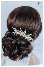 Rhianna however has experimented with coloring her hair orange red over a short bob which is layered and has sharp edges and bangs falling below the forehead into her eyes. 10 Beautiful Wedding Hairstyles For Long Hair L Pink Book Weddings