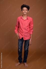 young indian boy wearing smart cal