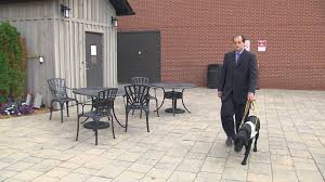 blind man with guide dog denied service