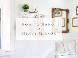How To Hang A Heavy Mirror She Holds