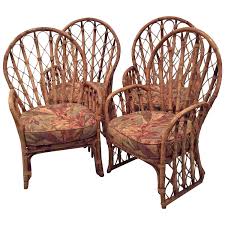 Lounge in ultimate comfort and style with chic daybeds, beautiful rattan swings and sleek gravity chairs that will make your patio come alive. Rattan Wicker Arm Dining Chairs Vintage Set Of 4 Faux Bamboo Palm Beach Patio At 1stdibs