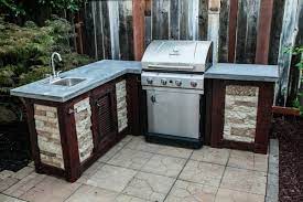 You can run a supply line from the house (the most expensive. How To Build Your Own Outdoor Kitchen For A Fraction Of The Cost Build Outdoor Kitchen Outdoor Kitchen Design Diy Outdoor Kitchen