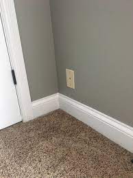 gray paint brown carpet