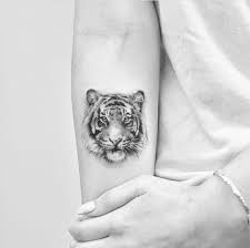 Tiger tattoo | Tiger tattoo, Cool tattoos, Tattoos