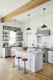The kitchen now features cool bar stools and a new antique sign.magnolia. Joanna Gaines Updated Her Family S Farmhouse See Inside
