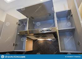Cupboard With Extractor Fan In Modern Apartment Kitchen