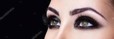 woman eyes with evening makeup stock