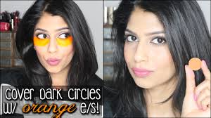 dark circles with orange eyeshadow