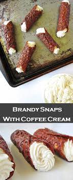 Ginger brandy snaps, or simply brandy snaps as they a better known, originate from yorkshire in the united kingdom and were traditionally made by a company named wright and co. Brandy Snaps With Coffee Cream Alison S Wonderland Recipes