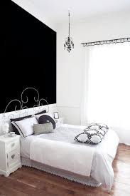 black wall behind the bed in the old