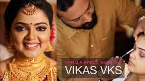 kerala hindu bridal makeup by vikas vks