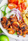 blackened shrimp with onions and tomatoes