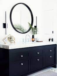 Black & white bathrooms bathroom colors bathrooms black and white color contemporary bathrooms bathroom designs room designs contemporary design styles traditional modern bathrooms modern sleek mix designer ana donohue chose black glass tiles for the shower and a black lacquer vanity for a contemporary look that shines. According To An Expert Every White Bathroom Needs These 17 Things Bathroom Trends Stylish Bathroom Bathroom Inspiration