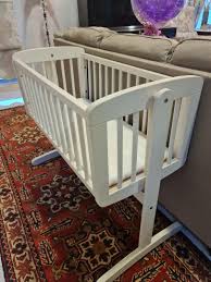 mothercare swinging crib natural
