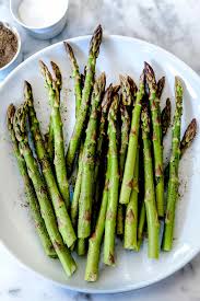 Asparagus on a grill will quickly react to the heat so stay alert. How To Make The Best Grilled Asparagus Foodiecrush Com
