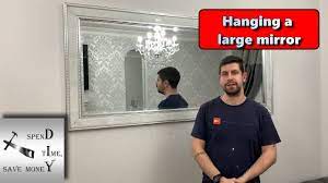 hanging a large mirror or picture step
