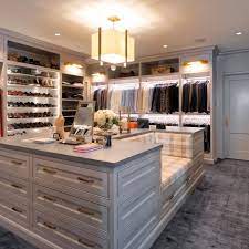 Sparkling closet island with drawers traditional master custom storage gl s california closets baltimore walk in crown molding. Photos Hgtv