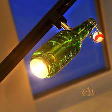 track light green glass beer bottle