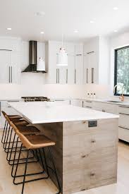 Blacks, white and grays are popular cabinet colors in a contemporary design. Two Toned Modern Kitchen Alpine Cabinetry Alpine Cabinetry