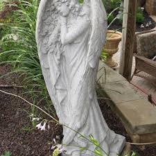 concrete angel statue casey and gram