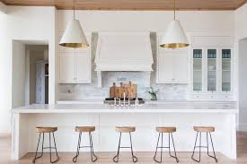 long kitchen island with five stools