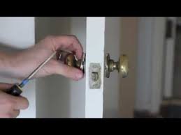 brass door knob with joe rus