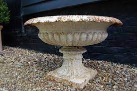 a large victorian cast iron urn