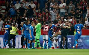The ligue 1 game at nice was halted when a fight broke out after fans threw a bottle at marseille players, who then threw the object back . Blyxcawzobt2km