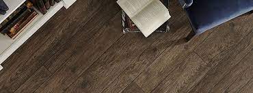 Featuring carpet & hardwood floors. Luxury Vinyl Plank Tile Wall To Wall Floors