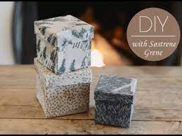 decorate boxes with glue and napkins