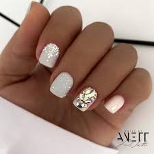74 white nails with diamonds that will