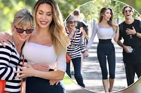 She is the daughter of the iconic grease star olivia newton john & actor matt lattanzi. Olivia Newton John Cuddles Daughter Chloe Lattanzi Outside Dancing With The Stars Rehearsals Mirror Online