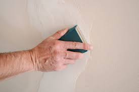 how to repair s in plaster walls