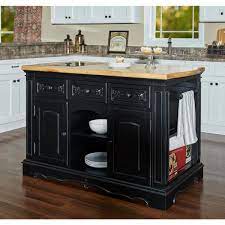 Shop our best selection of portable kitchen islands & carts to reflect your style and inspire your home. Powell Company Natural Pennfield Black Kitchen Island Granite Top 318 416 The Home Depot