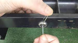 a desk drawer lock with paper clips