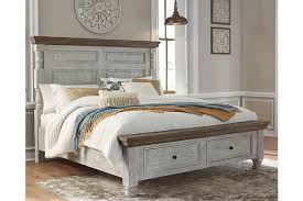 Start with a bed style and let the rest of the décor follow or fall in love with a single piece and synchronize accordingly. Havalance Queen Poster Bed With 2 Storage Drawers Ashley Furniture Homestore