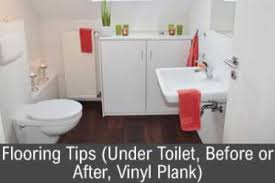 flooring tips under toilet before or