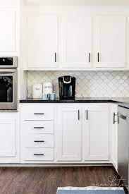 White shaker cabinets with matte black hardware / the best modern minimal cabinet hardware the identite collective / cabinet hardware is often referred to as the jewelry of a kitchen, and just like with an outfit, it can really alter the overall look of your space. Kitchen Hardware Trends 2021 Jenna Kate At Home