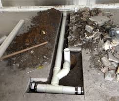repair a drain in a concrete floor