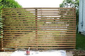 modern wood slatted outdoor privacy