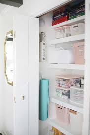how i organized my hall closet in one
