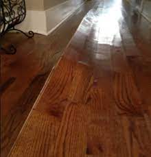 hardwood floor bowing causes and
