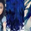 Blue will appear very faint on brown or black hair as a tinge that you'll only see in the light, so if you want it to be bright, you'll need to bleach the hair before you apply the blue dye. 1