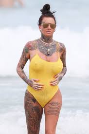 Jemma Lucy Was Pictured In A Yellow Swimsuit Holding Her