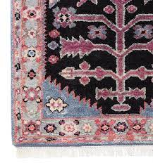 pink and black antique persian rug