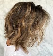 This haircut has interesting side bangs. 60 Medium Length Haircuts And Hairstyles To Pull Off In 2021